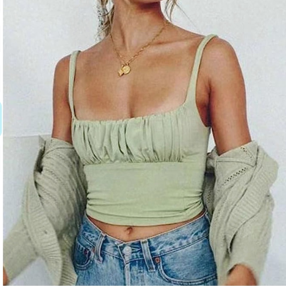 Army green. Size M. NEVER WORN / TAGS ON